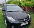 Чорний Мазда 5, об'ємом двигуна 2 л та пробігом 260 тис. км за 4999 $, фото 1 на Automoto.ua