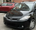 Черный Мазда 5, объемом двигателя 2 л и пробегом 280 тыс. км за 2700 $, фото 1 на Automoto.ua