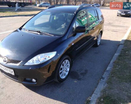 Черный Мазда 5, объемом двигателя 2 л и пробегом 318 тыс. км за 6300 $, фото 2 на Automoto.ua