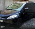 Черный Мазда 5, объемом двигателя 1.8 л и пробегом 250 тыс. км за 5750 $, фото 1 на Automoto.ua