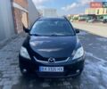 Черный Мазда 5, объемом двигателя 1.8 л и пробегом 250 тыс. км за 4500 $, фото 1 на Automoto.ua
