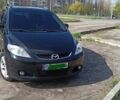 Черный Мазда 5, объемом двигателя 2 л и пробегом 298 тыс. км за 7000 $, фото 1 на Automoto.ua