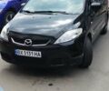 Черный Мазда 5, объемом двигателя 1.8 л и пробегом 250 тыс. км за 5200 $, фото 1 на Automoto.ua