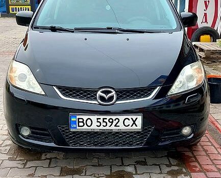 Черный Мазда 5, объемом двигателя 2 л и пробегом 350 тыс. км за 5000 $, фото 2 на Automoto.ua