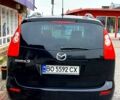 Черный Мазда 5, объемом двигателя 2 л и пробегом 350 тыс. км за 5000 $, фото 1 на Automoto.ua