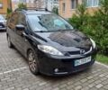 Черный Мазда 5, объемом двигателя 2 л и пробегом 286 тыс. км за 5016 $, фото 1 на Automoto.ua