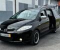 Черный Мазда 5, объемом двигателя 2 л и пробегом 220 тыс. км за 5899 $, фото 1 на Automoto.ua