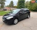 Черный Мазда 5, объемом двигателя 1.8 л и пробегом 208 тыс. км за 5500 $, фото 1 на Automoto.ua