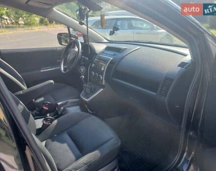 Черный Мазда 5, объемом двигателя 2 л и пробегом 245 тыс. км за 4600 $, фото 4 на Automoto.ua