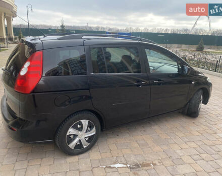 Черный Мазда 5, объемом двигателя 1.8 л и пробегом 233 тыс. км за 5500 $, фото 4 на Automoto.ua