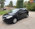 Черный Мазда 5, объемом двигателя 1.8 л и пробегом 209 тыс. км за 5600 $, фото 1 на Automoto.ua