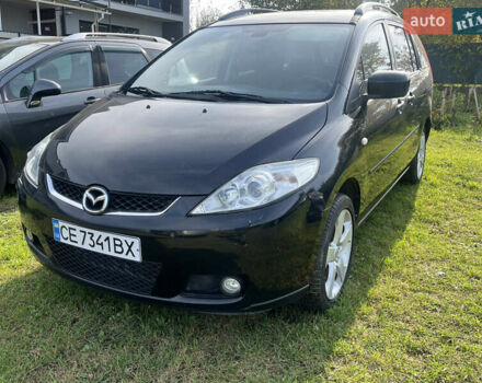 Черный Мазда 5, объемом двигателя 2 л и пробегом 244 тыс. км за 5500 $, фото 1 на Automoto.ua