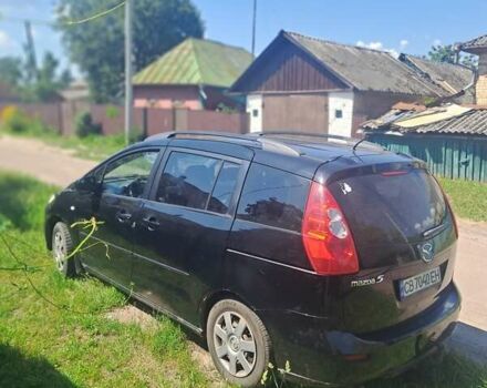 Черный Мазда 5, объемом двигателя 2 л и пробегом 290 тыс. км за 4000 $, фото 1 на Automoto.ua