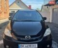 Черный Мазда 5, объемом двигателя 2 л и пробегом 273 тыс. км за 4500 $, фото 1 на Automoto.ua