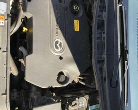 Черный Мазда 5, объемом двигателя 2 л и пробегом 424 тыс. км за 4500 $, фото 1 на Automoto.ua