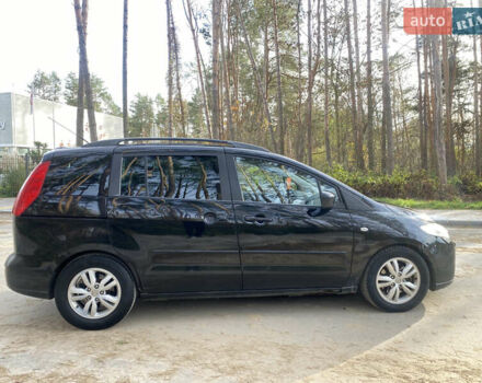 Черный Мазда 5, объемом двигателя 2 л и пробегом 200 тыс. км за 3600 $, фото 4 на Automoto.ua