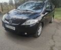 Черный Мазда 5, объемом двигателя 2 л и пробегом 227 тыс. км за 5200 $, фото 1 на Automoto.ua