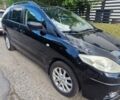 Черный Мазда 5, объемом двигателя 2 л и пробегом 325 тыс. км за 4400 $, фото 3 на Automoto.ua