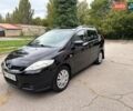 Чорний Мазда 5, об'ємом двигуна 1.8 л та пробігом 209 тис. км за 5600 $, фото 33 на Automoto.ua