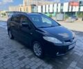 Черный Мазда 5, объемом двигателя 1.8 л и пробегом 250 тыс. км за 4500 $, фото 1 на Automoto.ua