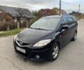 Черный Мазда 5, объемом двигателя 2 л и пробегом 230 тыс. км за 5500 $, фото 1 на Automoto.ua