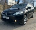 Чорний Мазда 5, об'ємом двигуна 2 л та пробігом 247 тис. км за 4999 $, фото 1 на Automoto.ua
