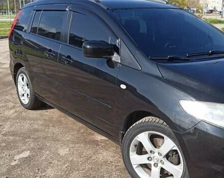 Черный Мазда 5, объемом двигателя 2 л и пробегом 298 тыс. км за 7000 $, фото 3 на Automoto.ua