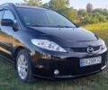 Черный Мазда 5, объемом двигателя 2 л и пробегом 276 тыс. км за 4550 $, фото 1 на Automoto.ua
