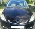 Чорний Мазда 5, об'ємом двигуна 2 л та пробігом 240 тис. км за 5297 $, фото 1 на Automoto.ua