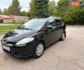 Черный Мазда 5, объемом двигателя 1.8 л и пробегом 208 тыс. км за 5500 $, фото 33 на Automoto.ua