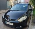 Черный Мазда 5, объемом двигателя 2 л и пробегом 286 тыс. км за 5000 $, фото 1 на Automoto.ua