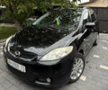 Черный Мазда 5, объемом двигателя 2 л и пробегом 228 тыс. км за 5100 $, фото 1 на Automoto.ua