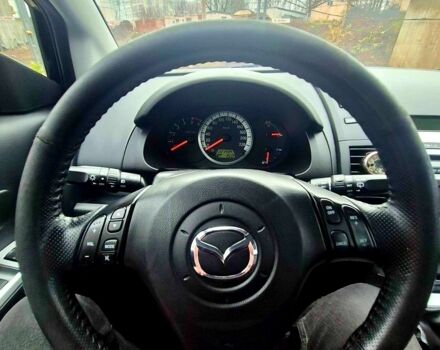 Черный Мазда 5, объемом двигателя 2 л и пробегом 221 тыс. км за 5300 $, фото 7 на Automoto.ua