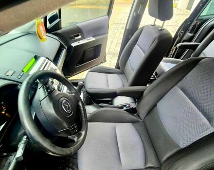 Черный Мазда 5, объемом двигателя 2 л и пробегом 221 тыс. км за 5300 $, фото 8 на Automoto.ua