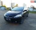 Черный Мазда 5, объемом двигателя 2 л и пробегом 297 тыс. км за 5300 $, фото 1 на Automoto.ua