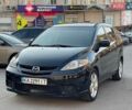 Черный Мазда 5, объемом двигателя 2.26 л и пробегом 318 тыс. км за 4950 $, фото 1 на Automoto.ua