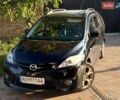Черный Мазда 5, объемом двигателя 2 л и пробегом 141 тыс. км за 7000 $, фото 1 на Automoto.ua