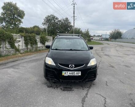 Черный Мазда 5, объемом двигателя 1.8 л и пробегом 302 тыс. км за 4250 $, фото 1 на Automoto.ua