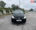 Черный Мазда 5, объемом двигателя 1.8 л и пробегом 302 тыс. км за 4250 $, фото 1 на Automoto.ua