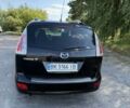 Черный Мазда 5, объемом двигателя 2 л и пробегом 249 тыс. км за 6500 $, фото 1 на Automoto.ua
