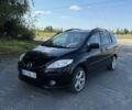 Черный Мазда 5, объемом двигателя 2 л и пробегом 249 тыс. км за 6500 $, фото 1 на Automoto.ua