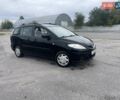 Черный Мазда 5, объемом двигателя 1.8 л и пробегом 302 тыс. км за 4250 $, фото 1 на Automoto.ua
