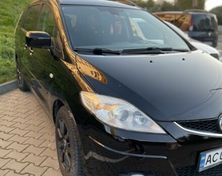 Черный Мазда 5, объемом двигателя 2 л и пробегом 325 тыс. км за 6200 $, фото 1 на Automoto.ua