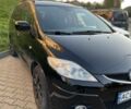 Черный Мазда 5, объемом двигателя 2 л и пробегом 325 тыс. км за 6200 $, фото 1 на Automoto.ua