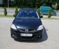 Черный Мазда 5, объемом двигателя 2 л и пробегом 299 тыс. км за 5200 $, фото 1 на Automoto.ua
