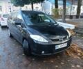 Черный Мазда 5, объемом двигателя 2 л и пробегом 290 тыс. км за 4500 $, фото 1 на Automoto.ua