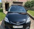 Черный Мазда 5, объемом двигателя 2 л и пробегом 141 тыс. км за 6300 $, фото 1 на Automoto.ua