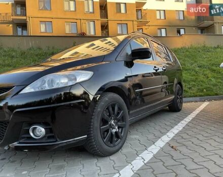 Черный Мазда 5, объемом двигателя 2 л и пробегом 325 тыс. км за 6200 $, фото 1 на Automoto.ua