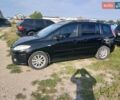 Черный Мазда 5, объемом двигателя 2 л и пробегом 239 тыс. км за 6300 $, фото 1 на Automoto.ua