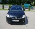 Черный Мазда 5, объемом двигателя 2 л и пробегом 299 тыс. км за 6000 $, фото 1 на Automoto.ua